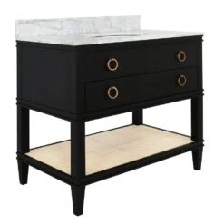Cutler - Bath Vanity In Matte Black Lacquer With Open Cane Shelf, White Marble Top, Porcelain Sink, And Antique Brass Ring Hardware -France and So Furniture CUTLER 20BLK ANGLE